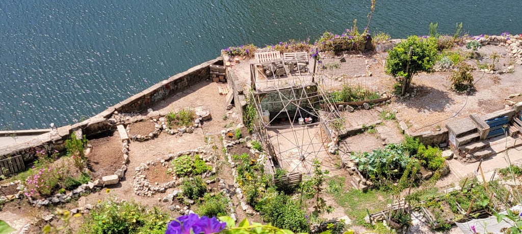 Small gardens along the edge of the Douro River in Porto