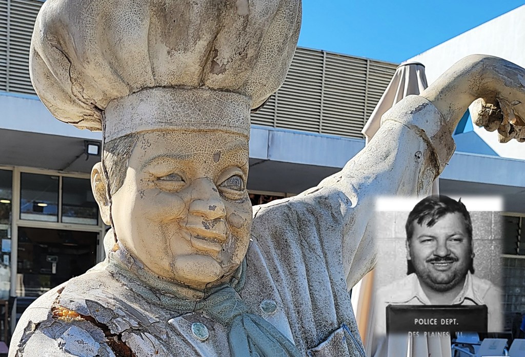Old statue of chef in Tavira, Portugal